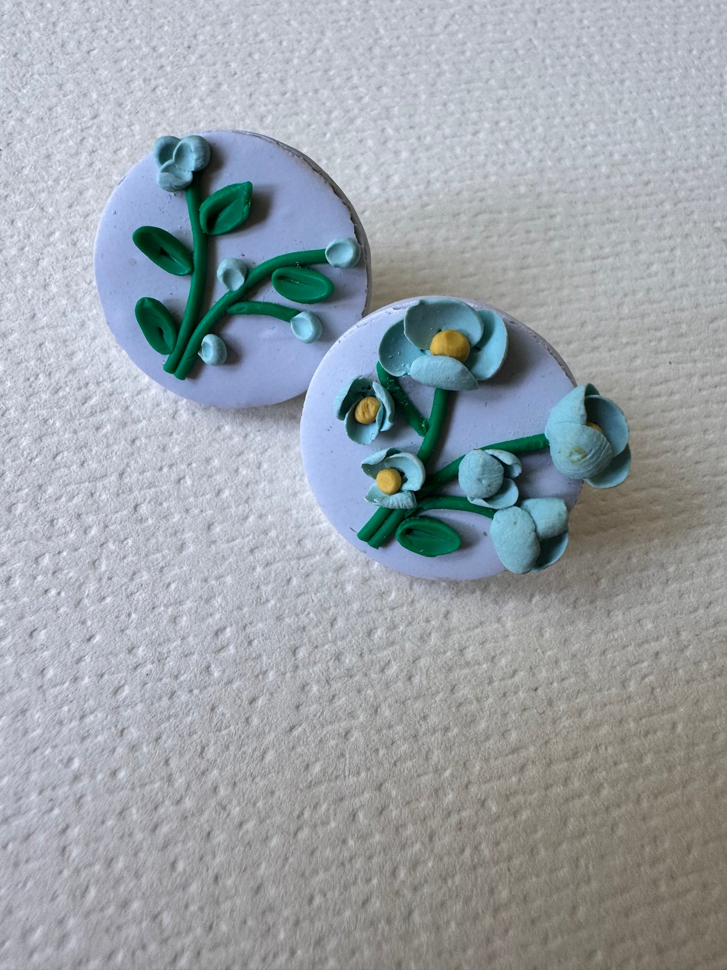 Blue botanical bloom studs