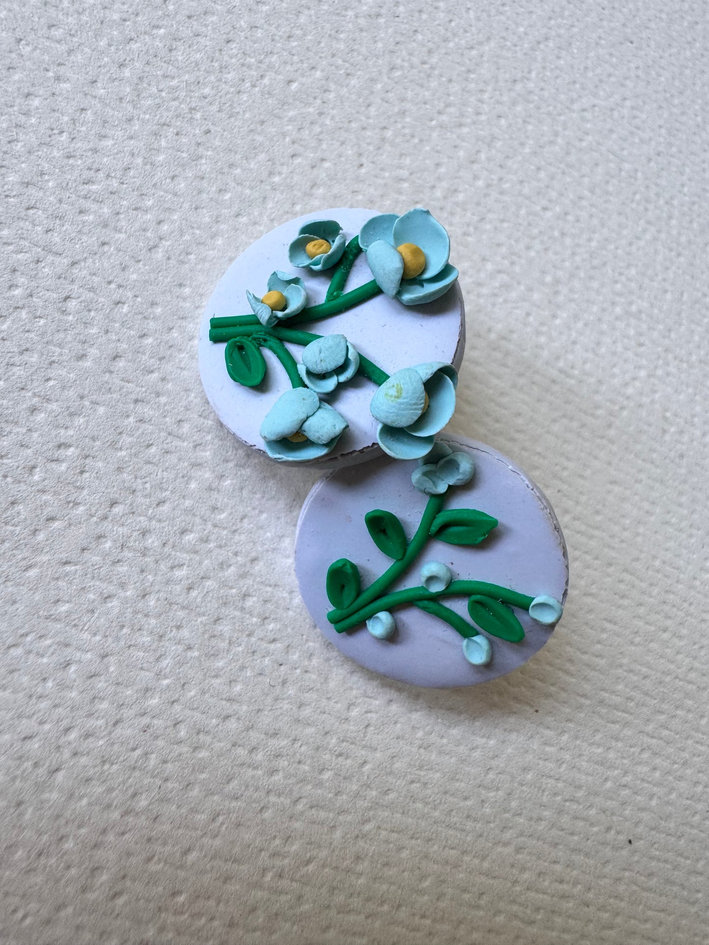 Blue botanical bloom studs