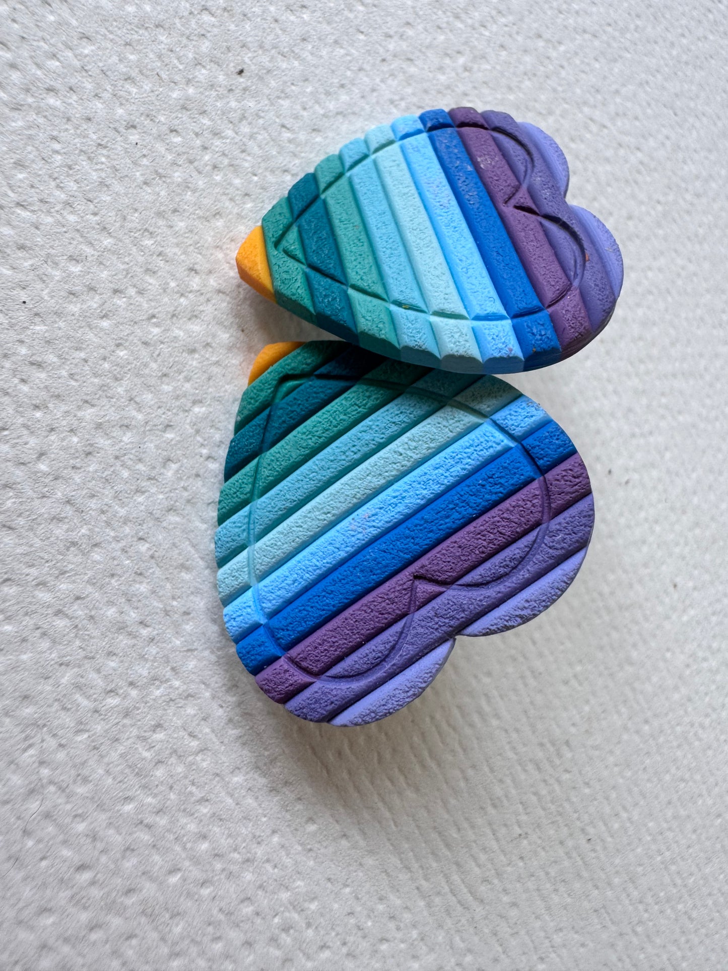 Textured blue rainbow heart studs