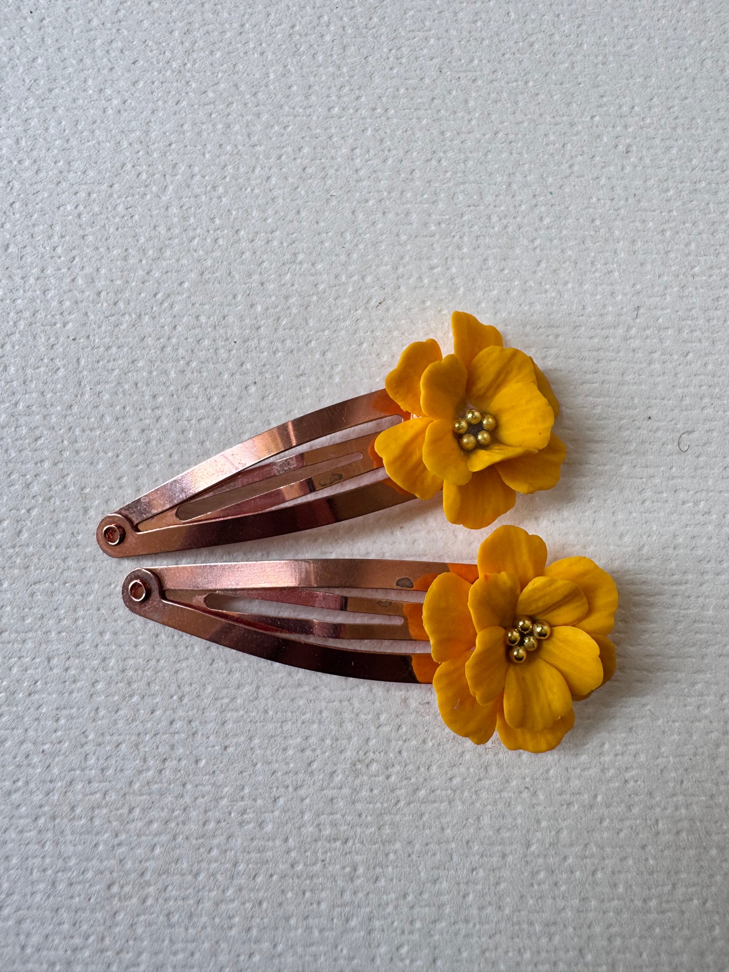 Yellow flower hair clips