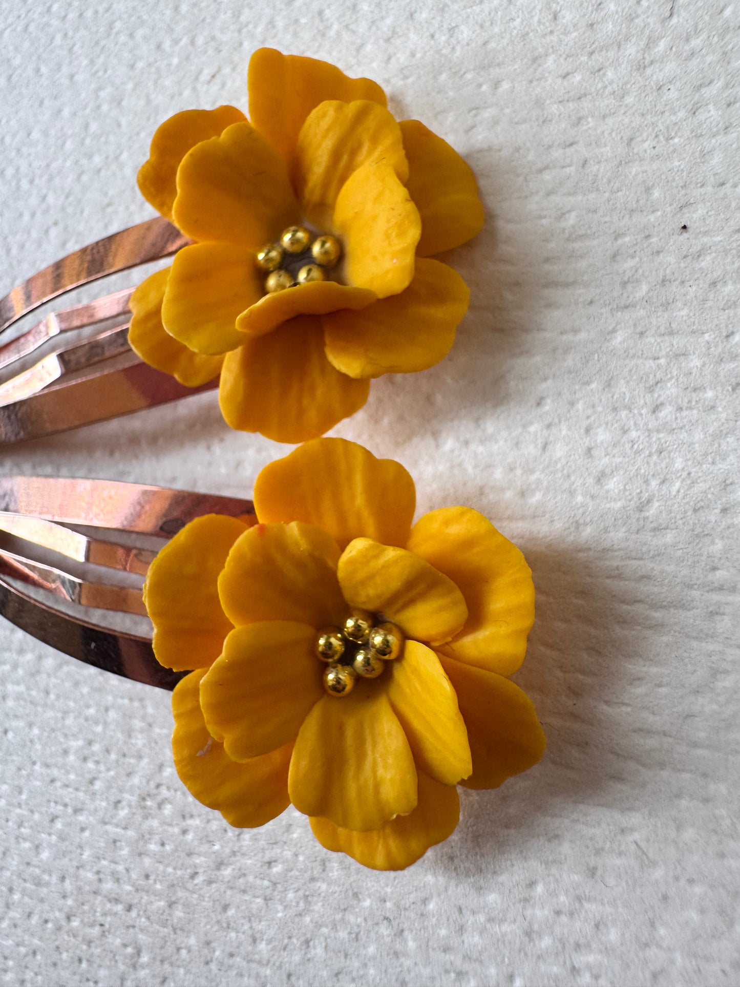 Yellow flower hair clips