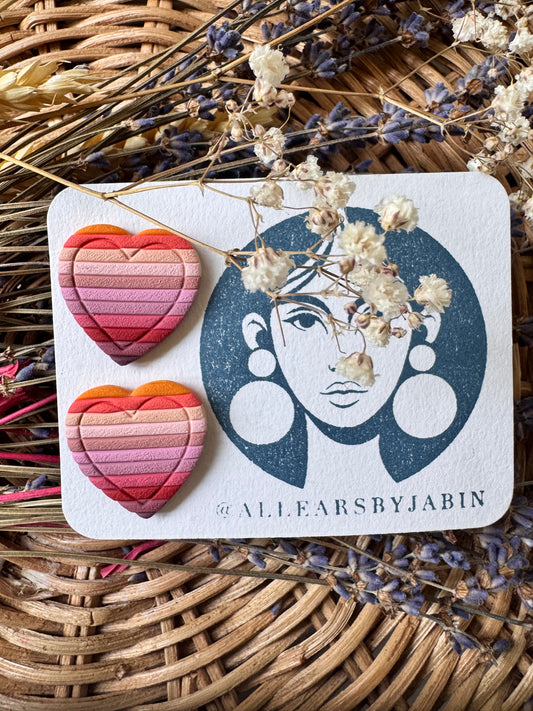 Textured red rainbow heart studs