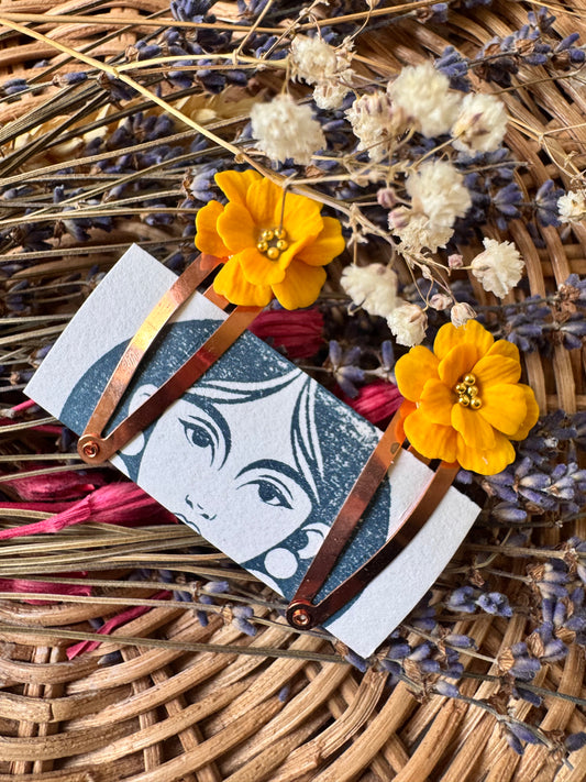 Yellow flower hair clips